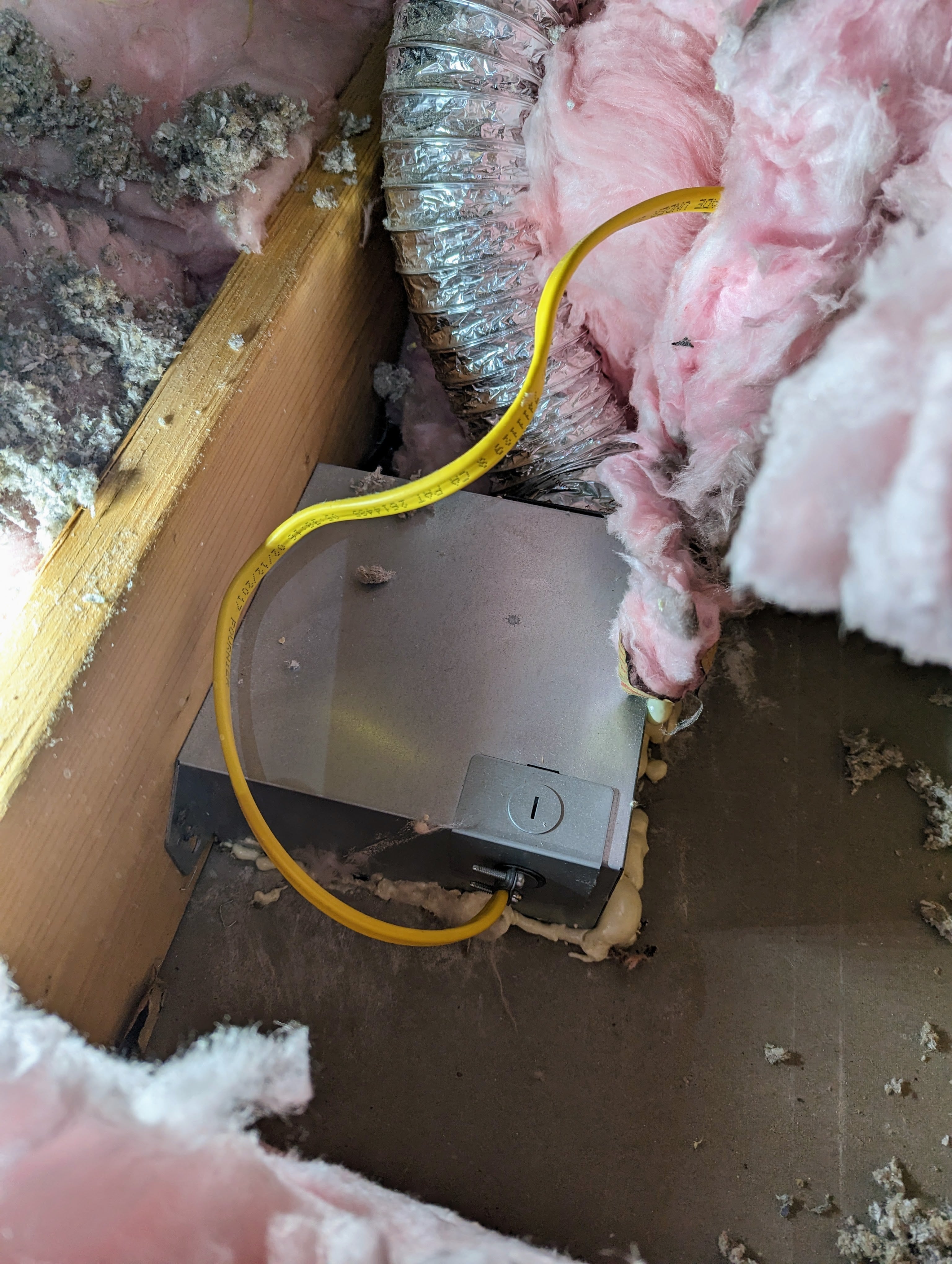 Old exhaust fan in attic